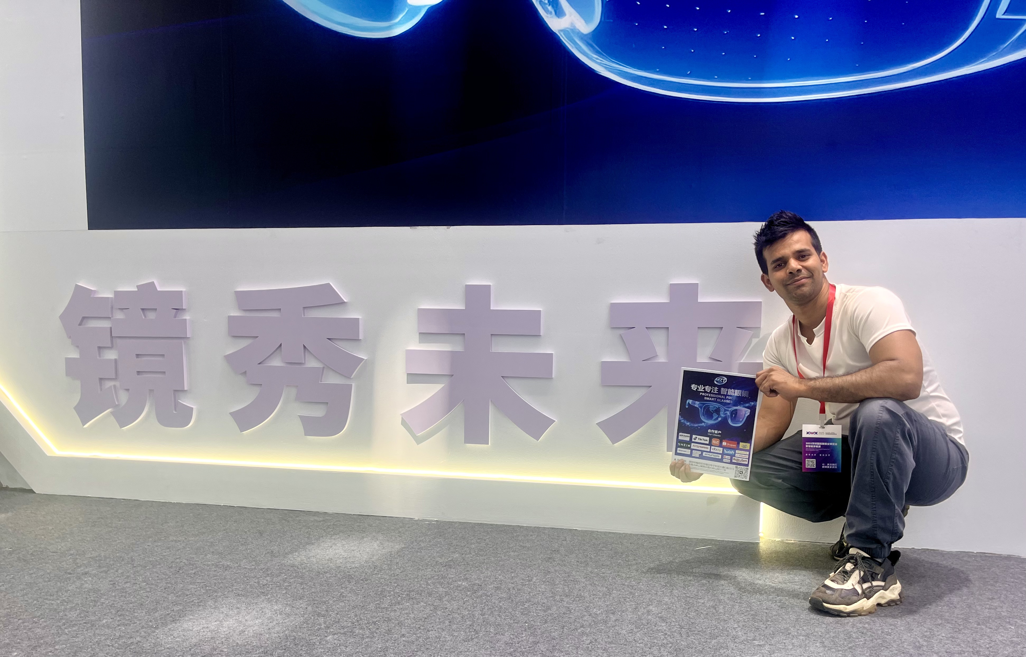 Reviewing a smart glasses supplier's product catalog at the Canton Fair
